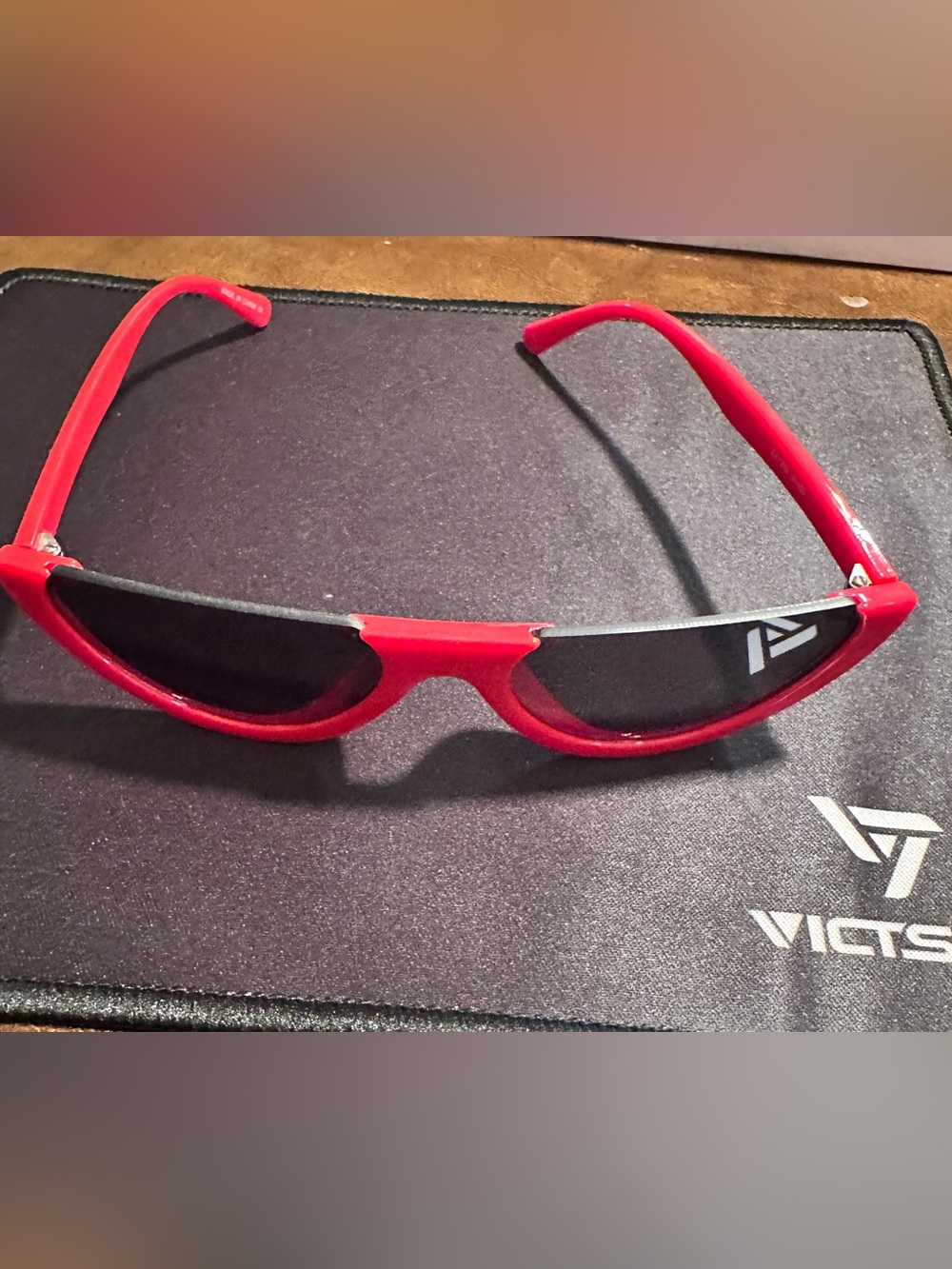Bold Red Crescent Sunglasses with Dark Lenses
S35
